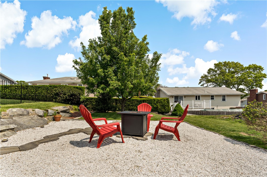 176 Rutland Street Cranston, RI 02920 - Photo 31 of 36 Fire Pit & Pear Tree