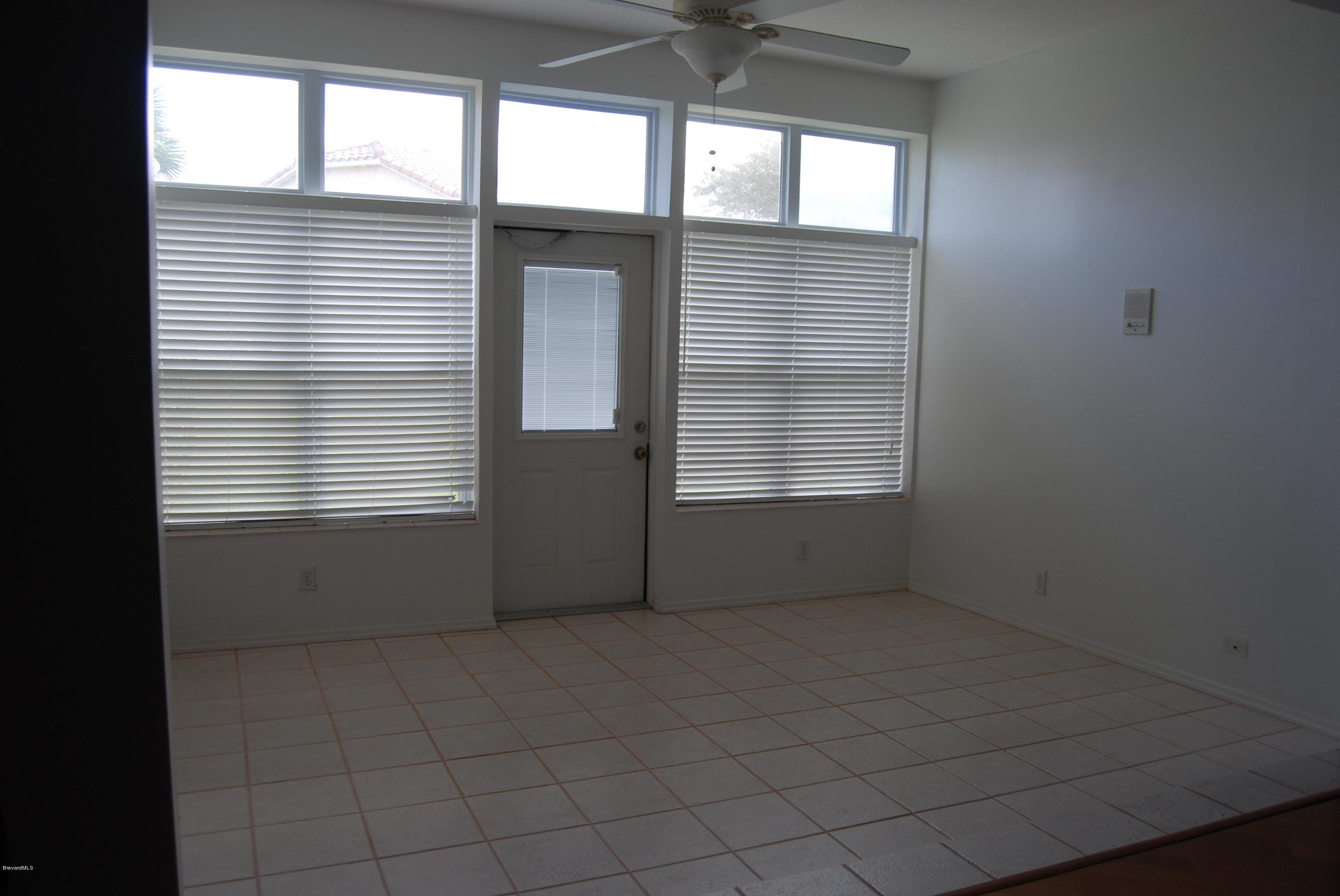 549 Renaissance Avenue Melbourne, FL 32940 - Photo 3 of 15 Enclosed Florida