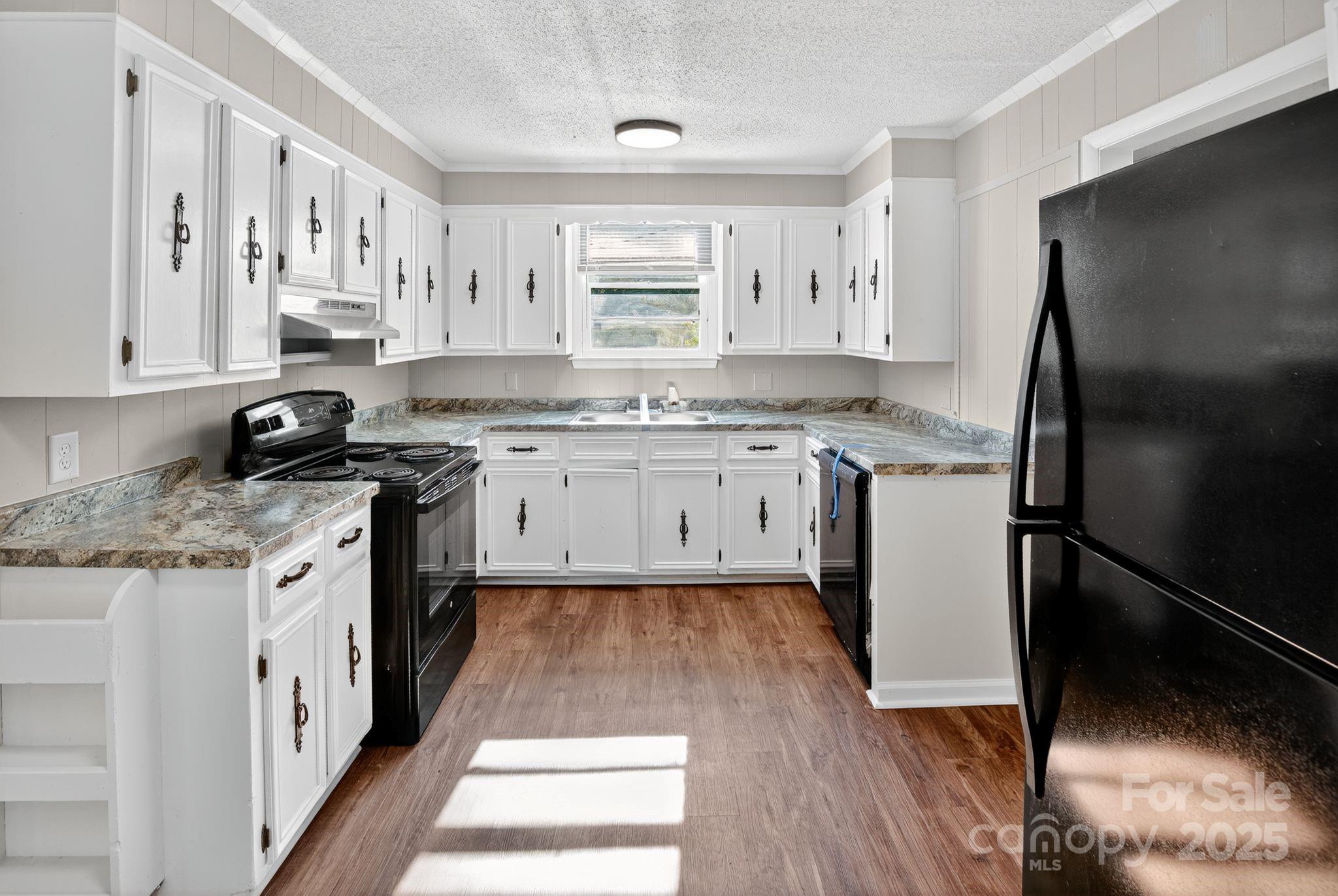 1527 Burnside Avenue Columbia, SC 29209 - Photo 16 of 31 a kitchen with a sink stove and refrigerator