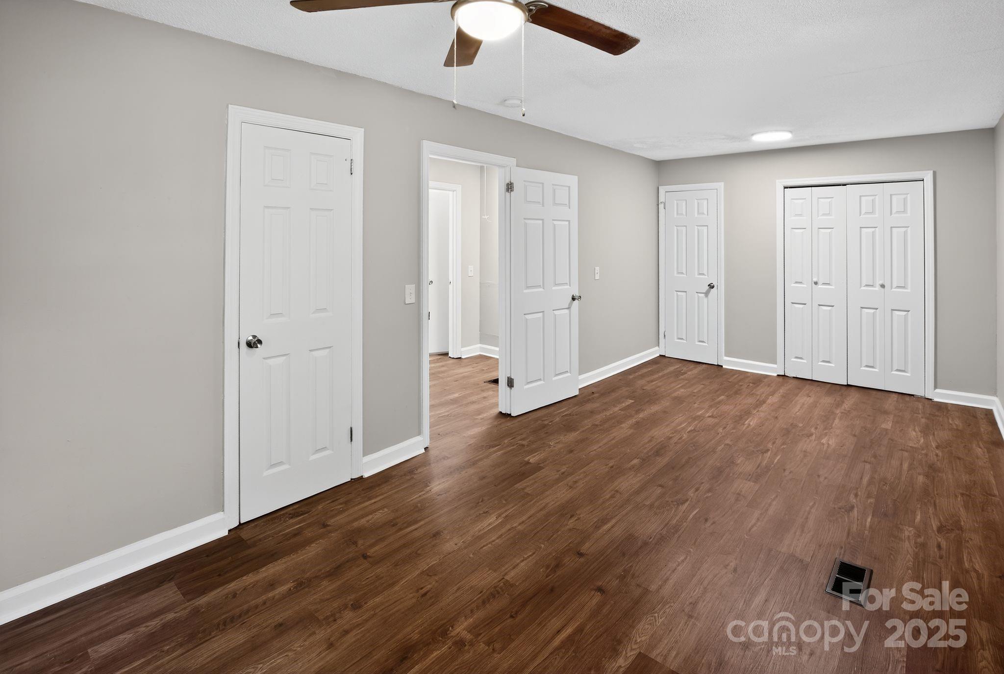 1527 Burnside Avenue Columbia, SC 29209 - Photo 17 of 31 wooden floor in an empty room with a window