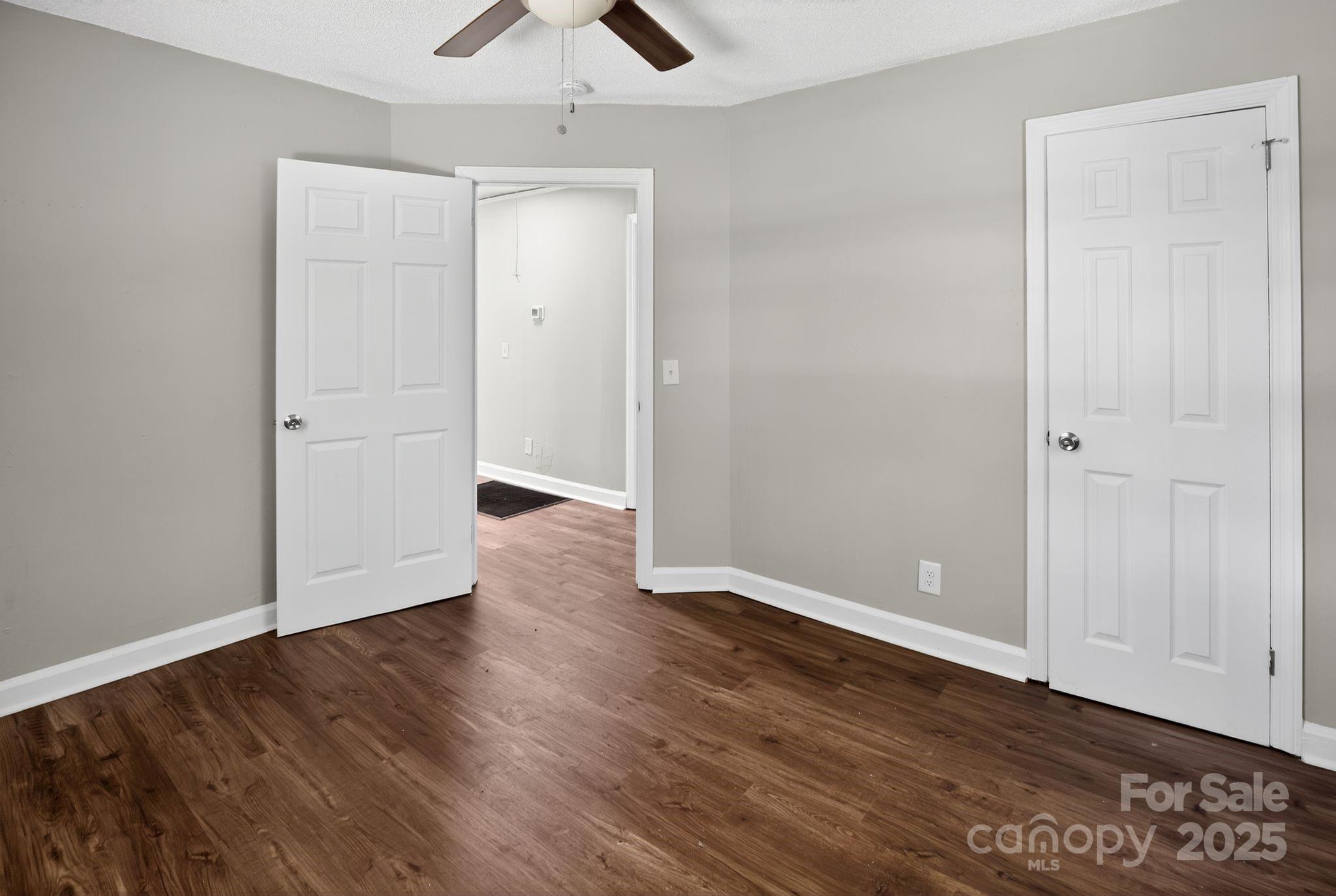 1527 Burnside Avenue Columbia, SC 29209 - Photo 18 of 31 an empty room with wooden floor and closet