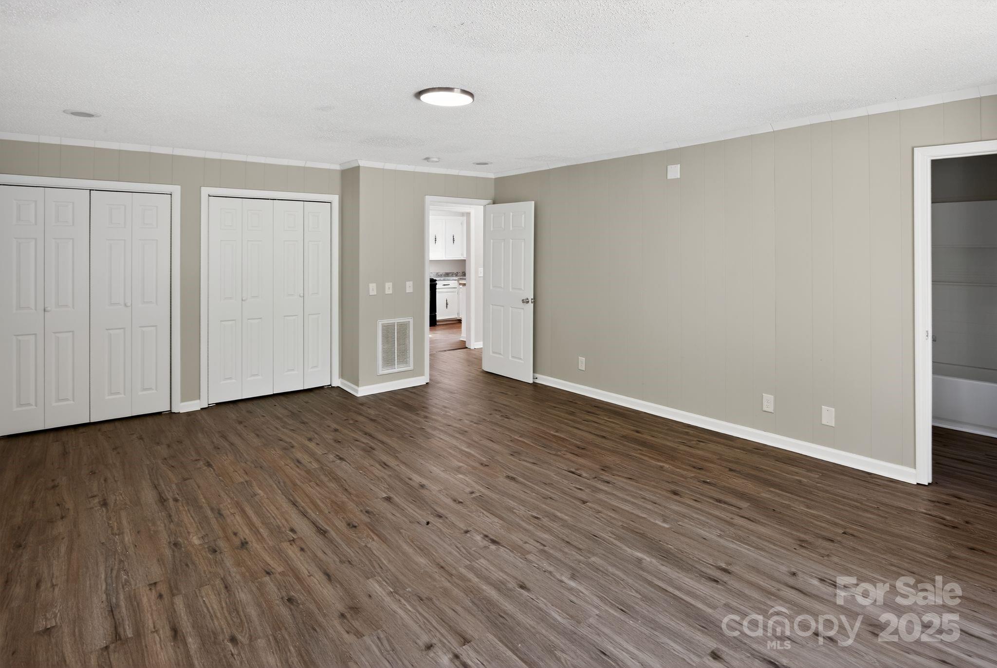 1527 Burnside Avenue Columbia, SC 29209 - Photo 19 of 31 a view of an empty room with wooden floor and closet