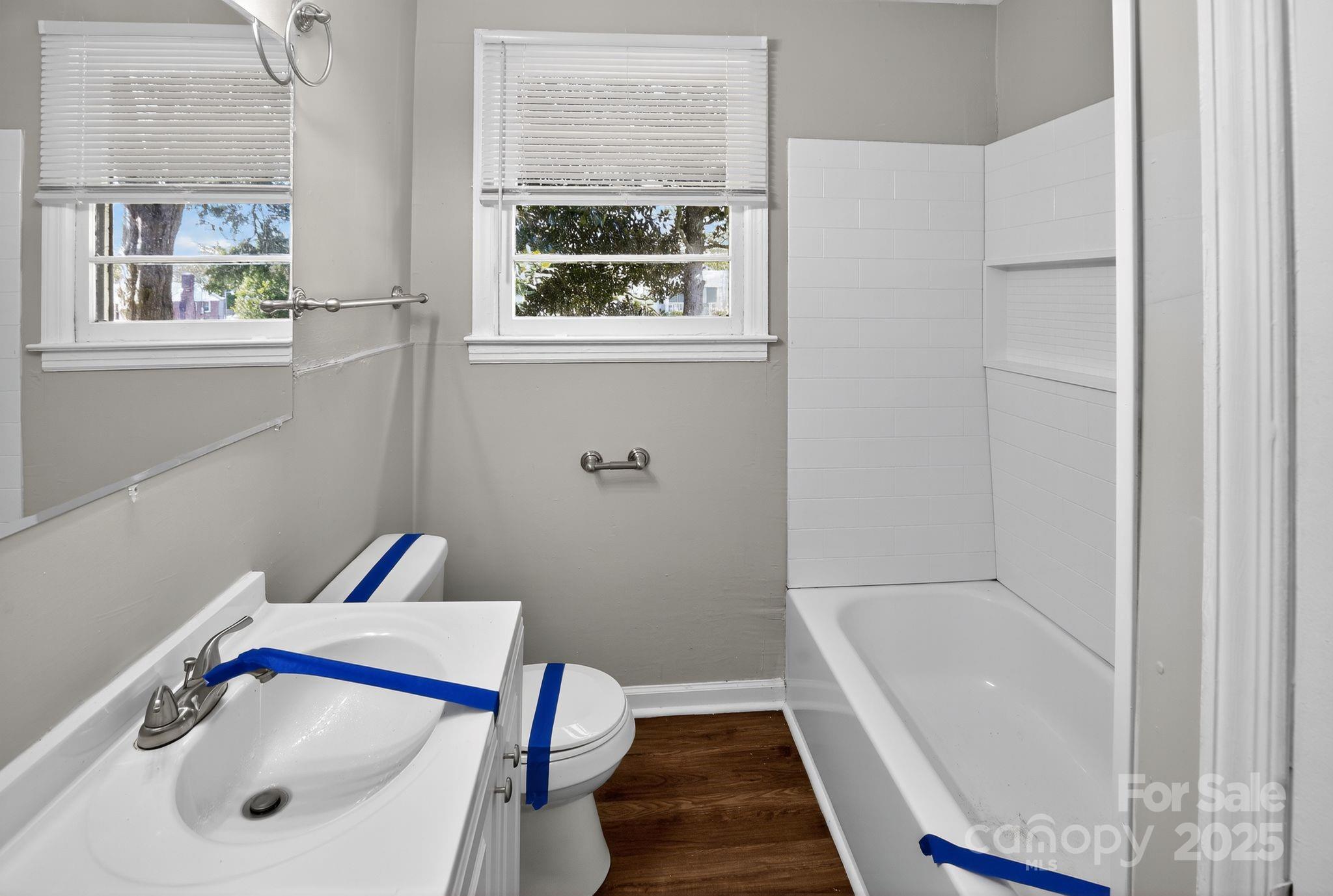 1527 Burnside Avenue Columbia, SC 29209 - Photo 25 of 31 a bathroom with a tub and a sink