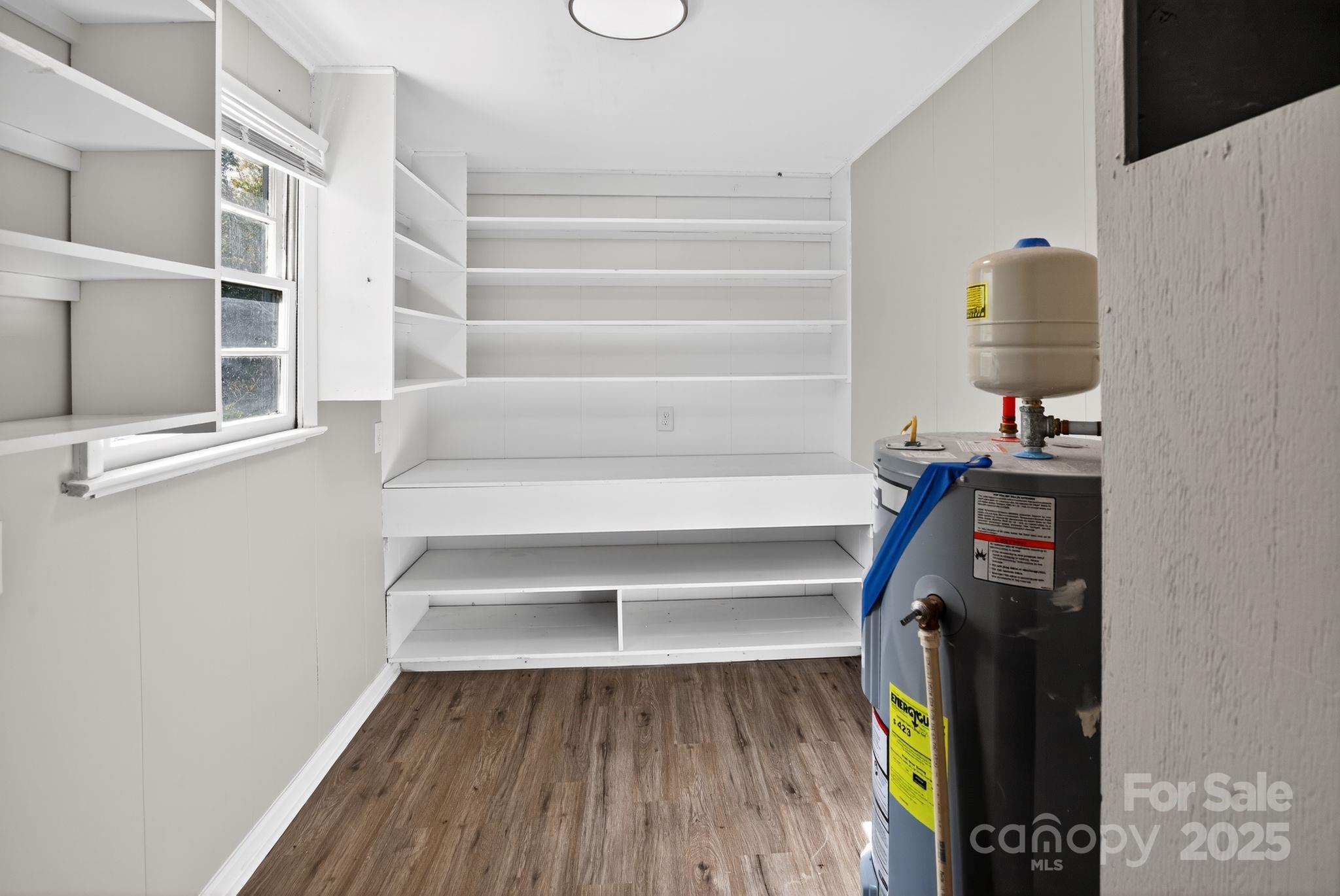 1527 Burnside Avenue Columbia, SC 29209 - Photo 27 of 31 a view of walk in closet with empty racks