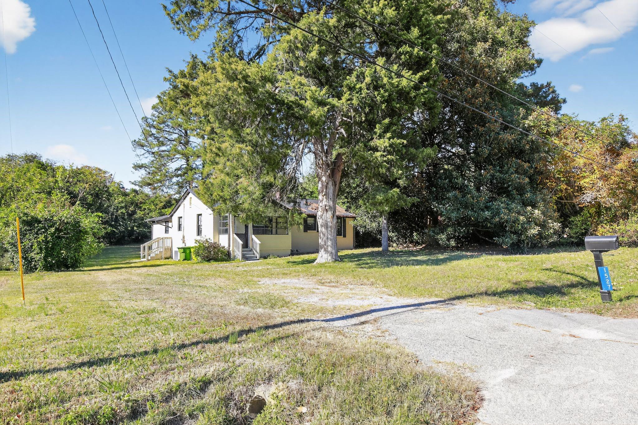 1527 Burnside Avenue Columbia, SC 29209 - Photo 5 of 31 a view of a house with a yard and large trees