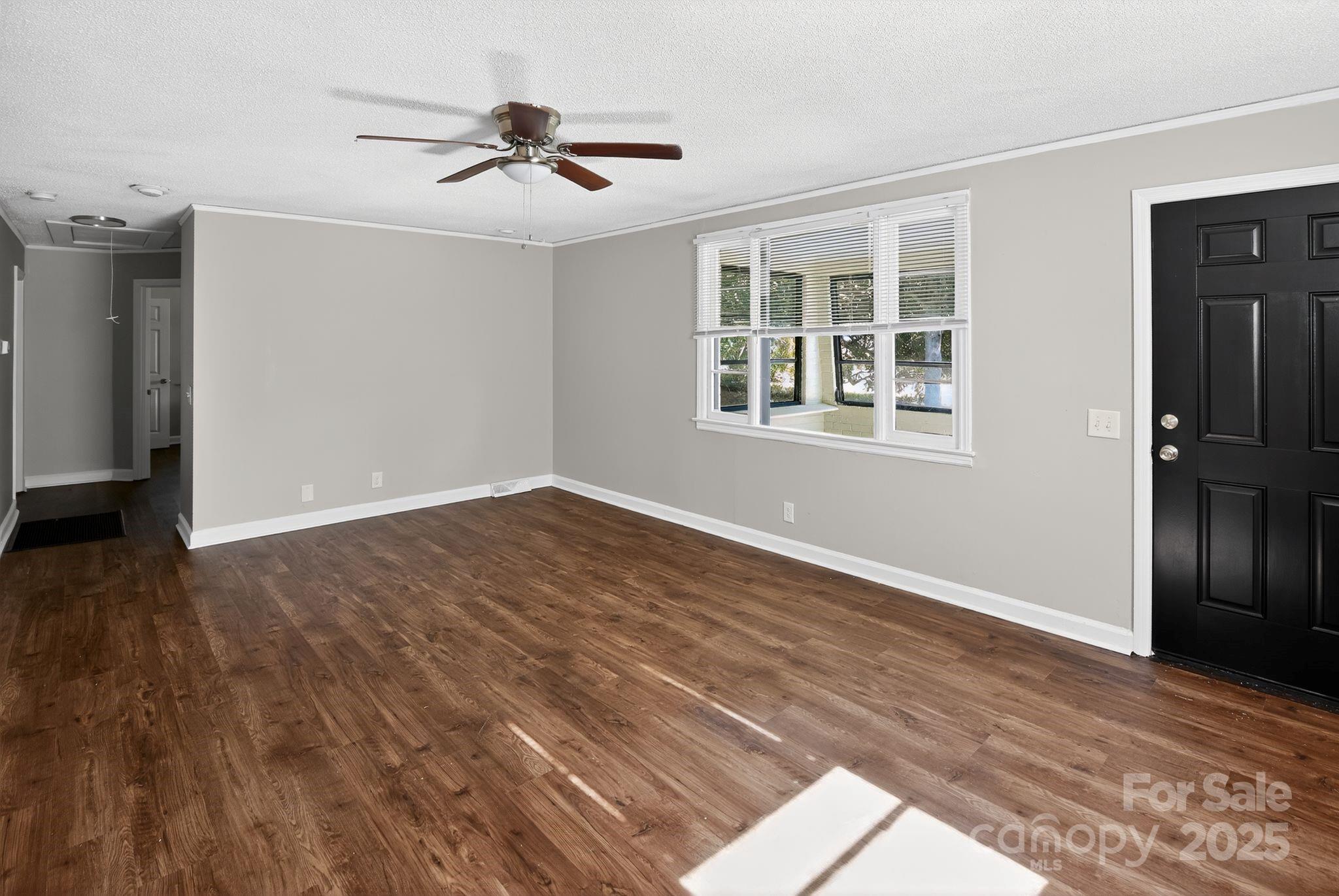 1527 Burnside Avenue Columbia, SC 29209 - Photo 8 of 31 a view of empty room with wooden floor and fan