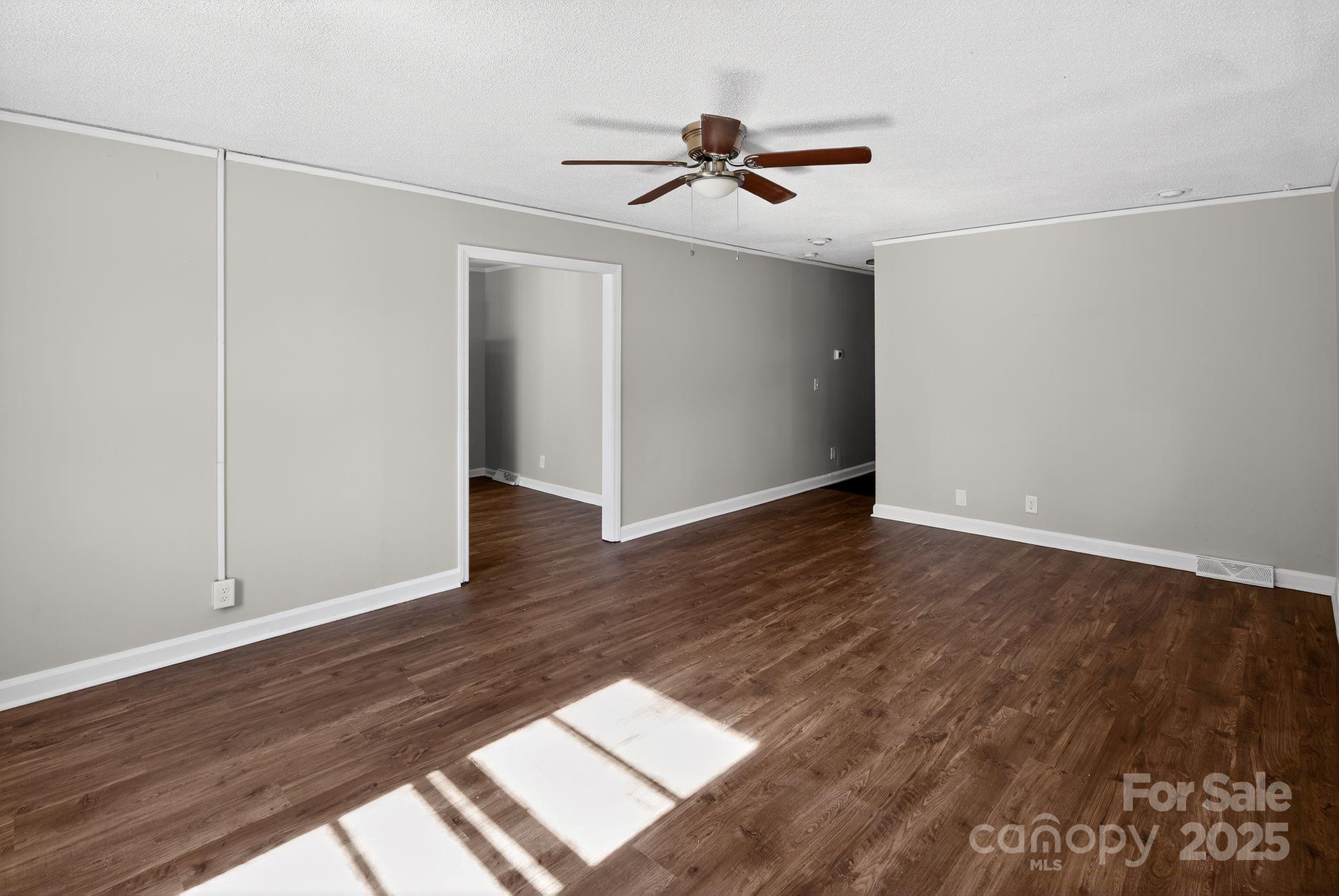 1527 Burnside Avenue Columbia, SC 29209 - Photo 10 of 31 an empty room with wooden floor closet and windows