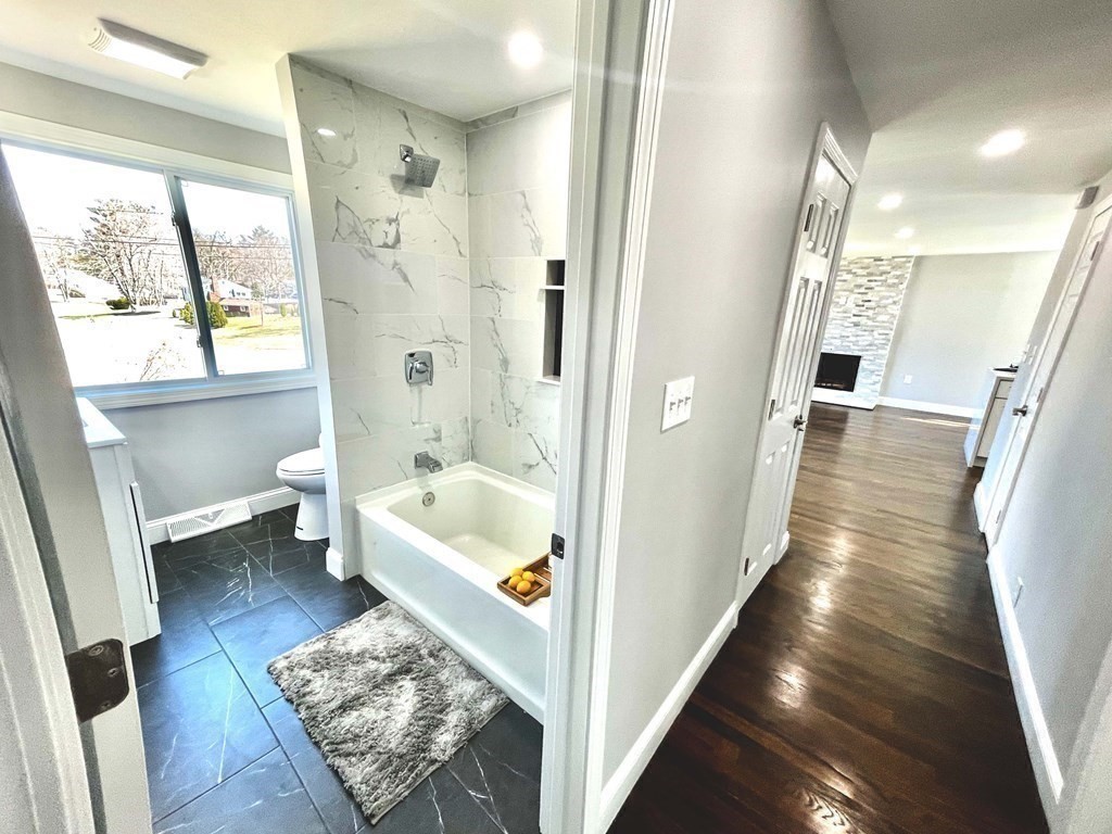 18 Haskell Road Pepperell, MA 01463 - Photo 23 of 36 a view of a bathroom with bathtub and shower