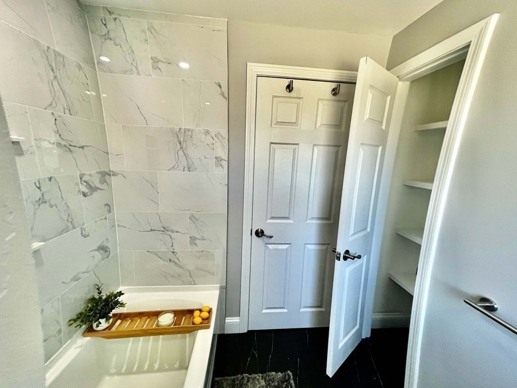 18 Haskell Road Pepperell, MA 01463 - Photo 28 of 36 a bathroom with a tub