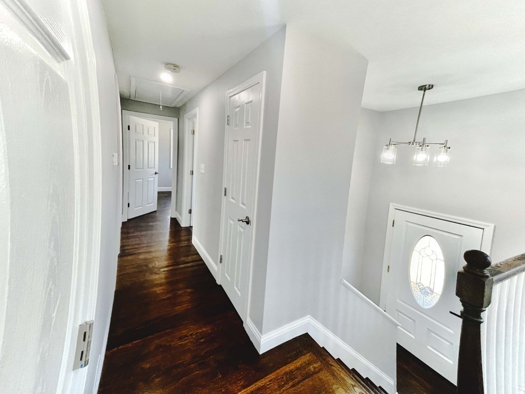18 Haskell Road Pepperell, MA 01463 - Photo 30 of 36 a view of a hallway with wooden floor and staircase