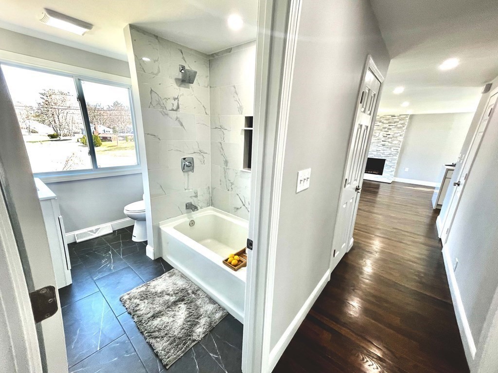18 Haskell Road Pepperell, MA 01463 - Photo 32 of 36 a view of a bathroom with bathtub and shower
