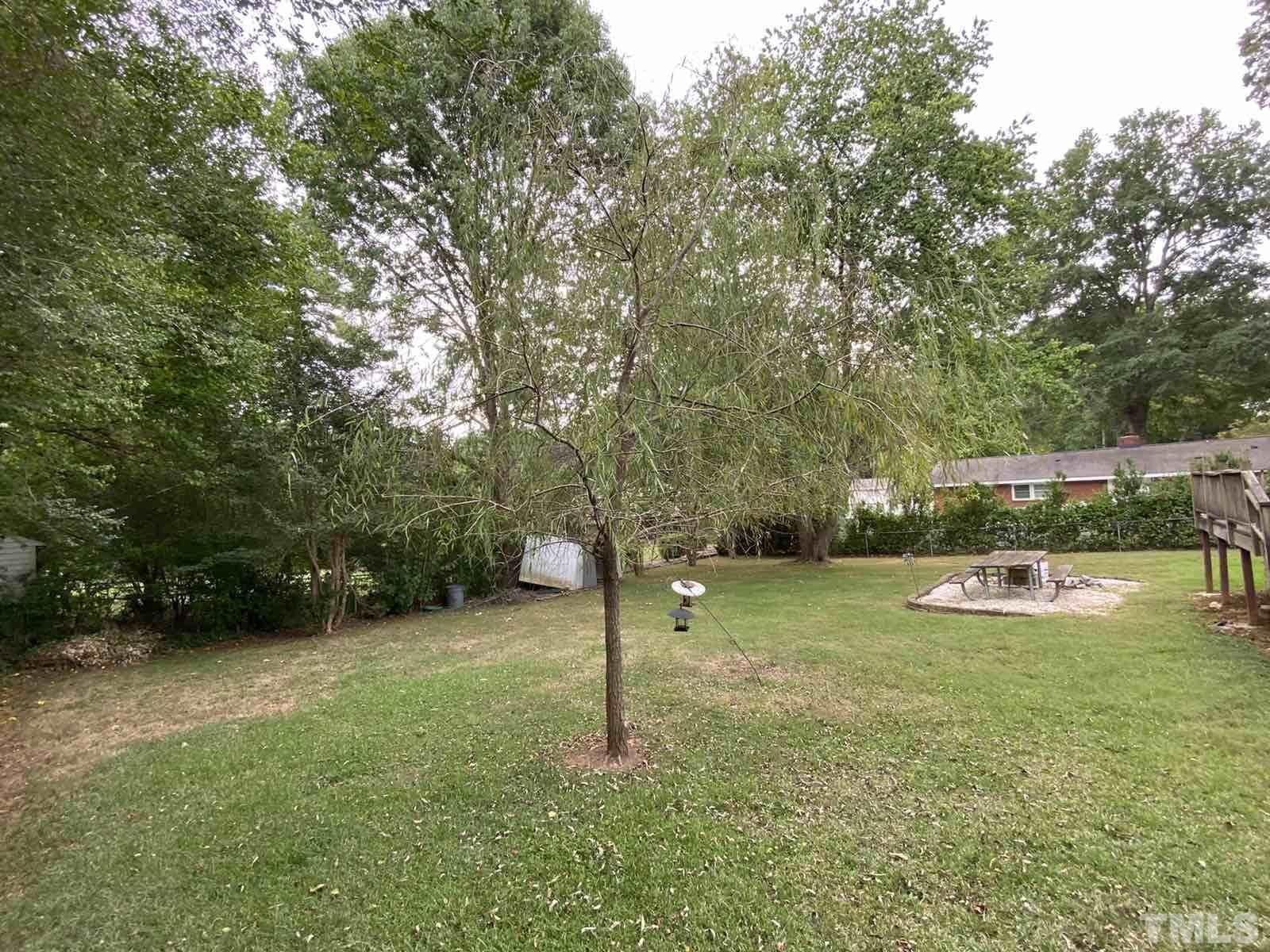 711 Kildaire Farm Road Cary, NC 27511 - Photo 17 of 19 a view of a garden with a slide