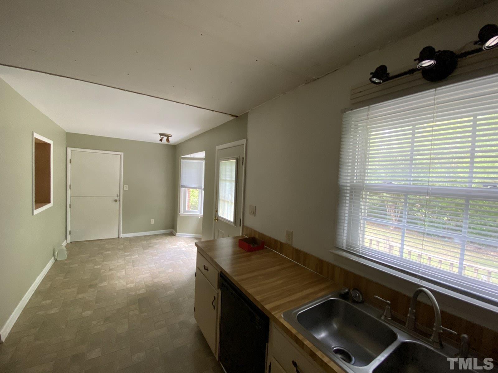 711 Kildaire Farm Road Cary, NC 27511 - Photo 6 of 19 a room with a window