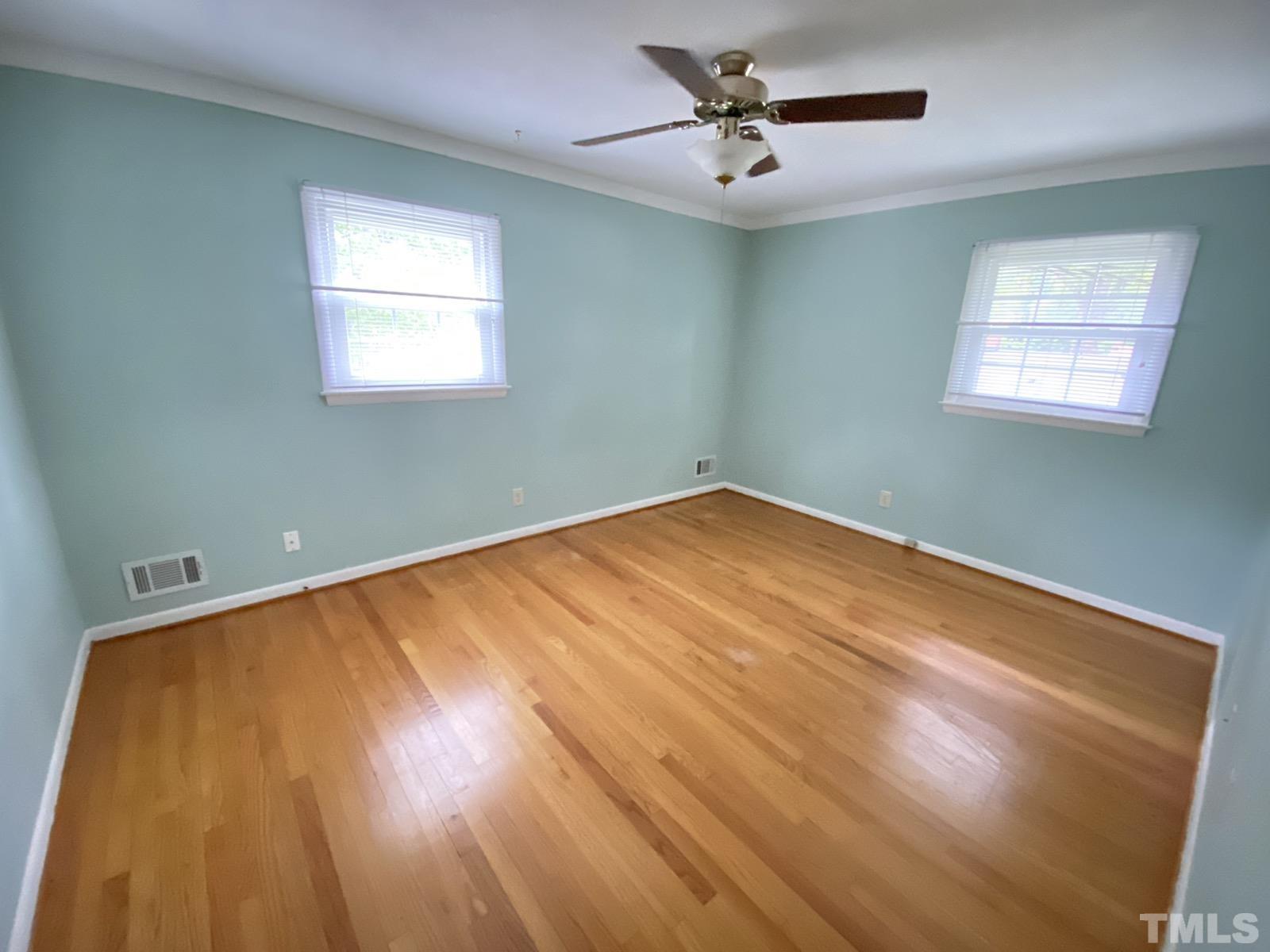 711 Kildaire Farm Road Cary, NC 27511 - Photo 10 of 19 a view of an empty room with a window