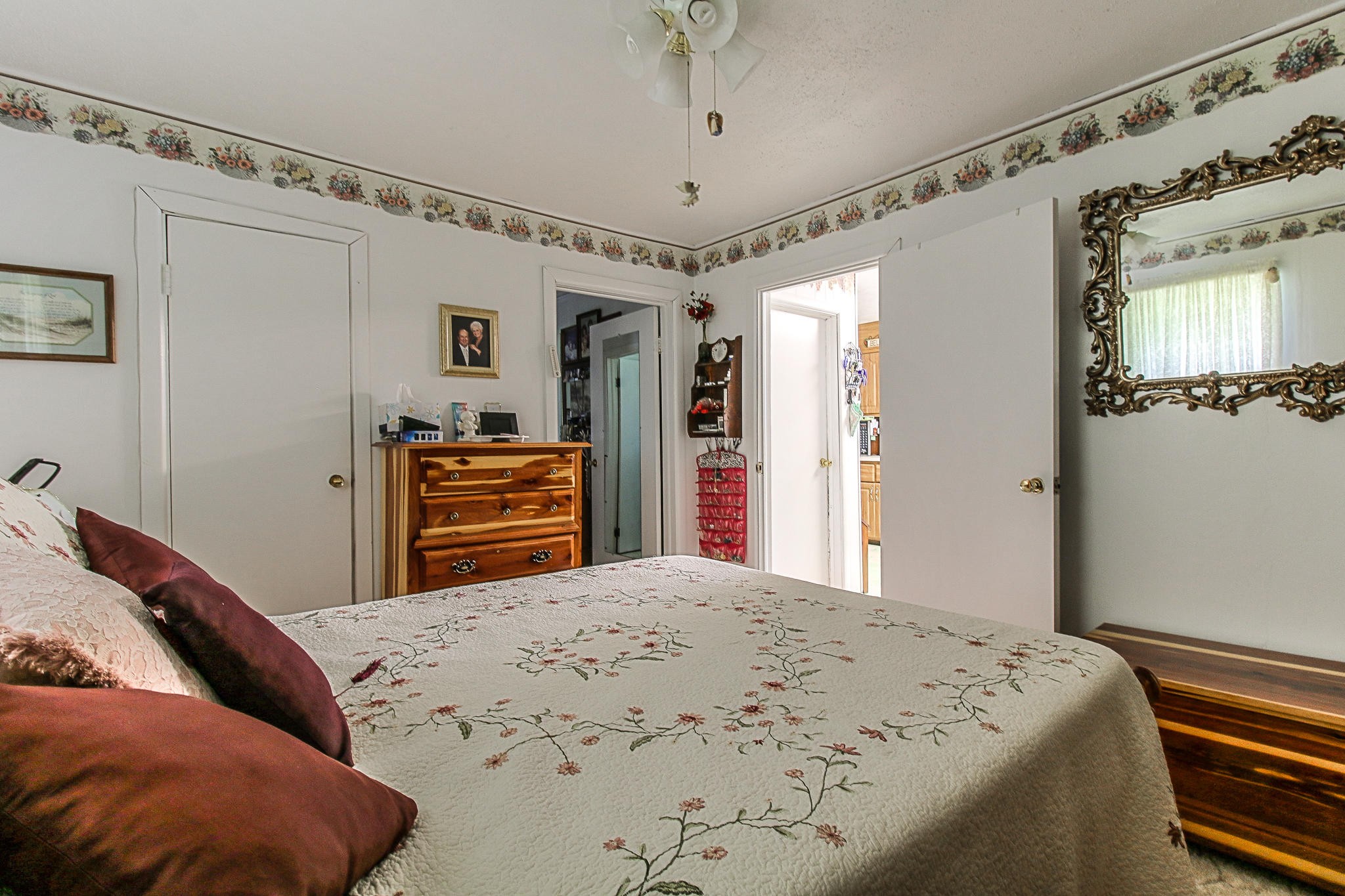 10425 Slemp Road Kodak, TN 37764 - Photo 14 of 21 a bedroom with a bed and a dresser