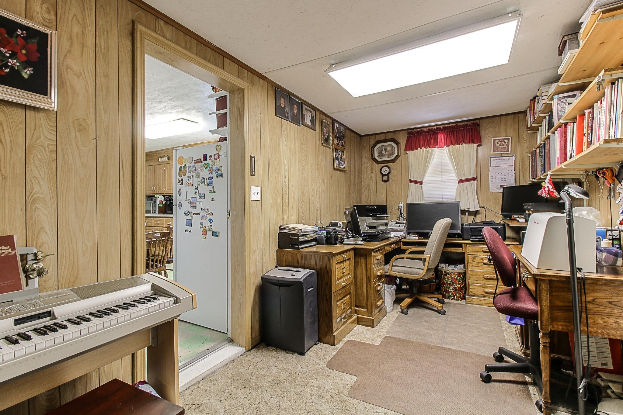 10425 Slemp Road Kodak, TN 37764 - Photo 18 of 21 a view of a workspace with furniture and a window