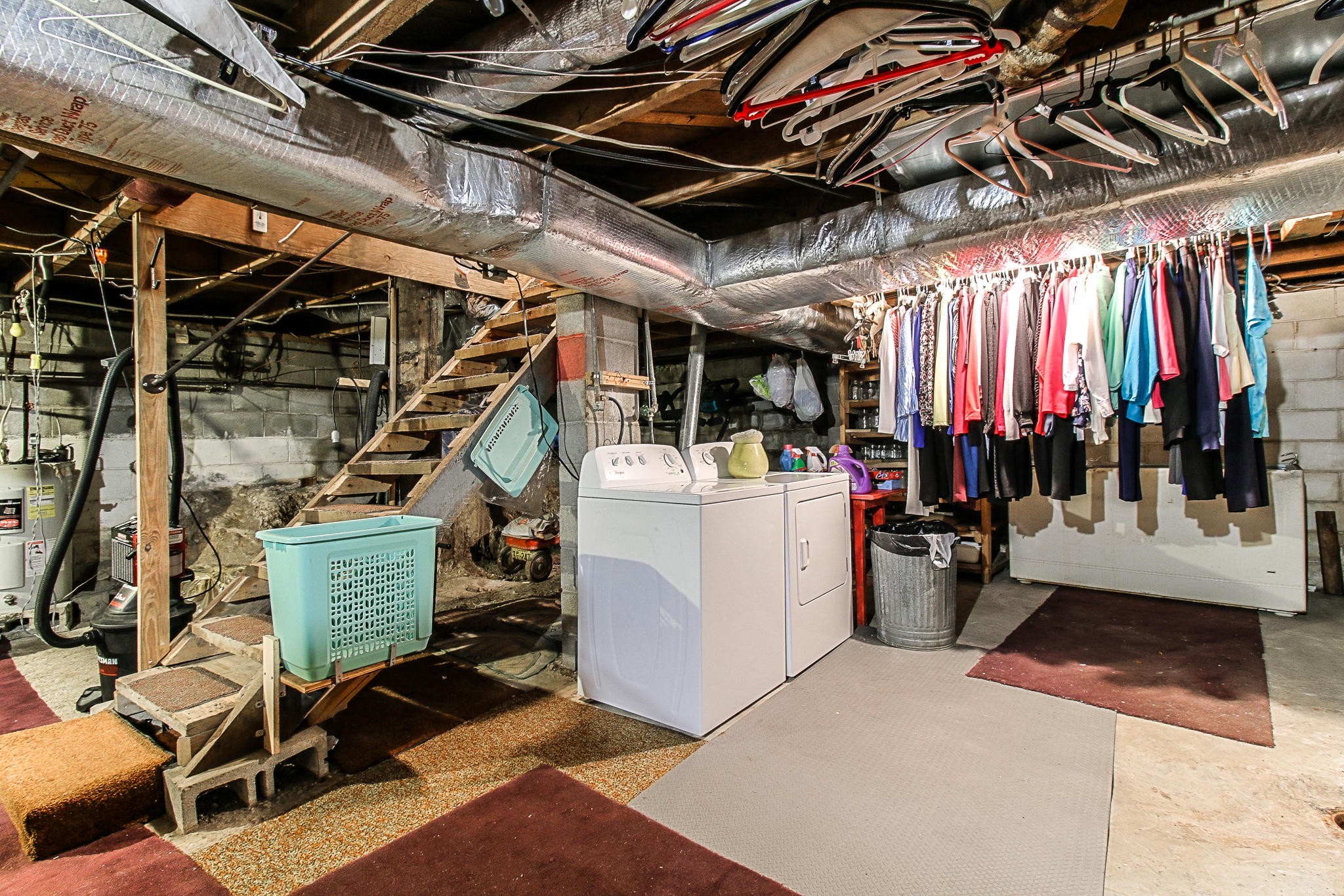 10425 Slemp Road Kodak, TN 37764 - Photo 21 of 21 a view of walk in closet with clothes and shoes