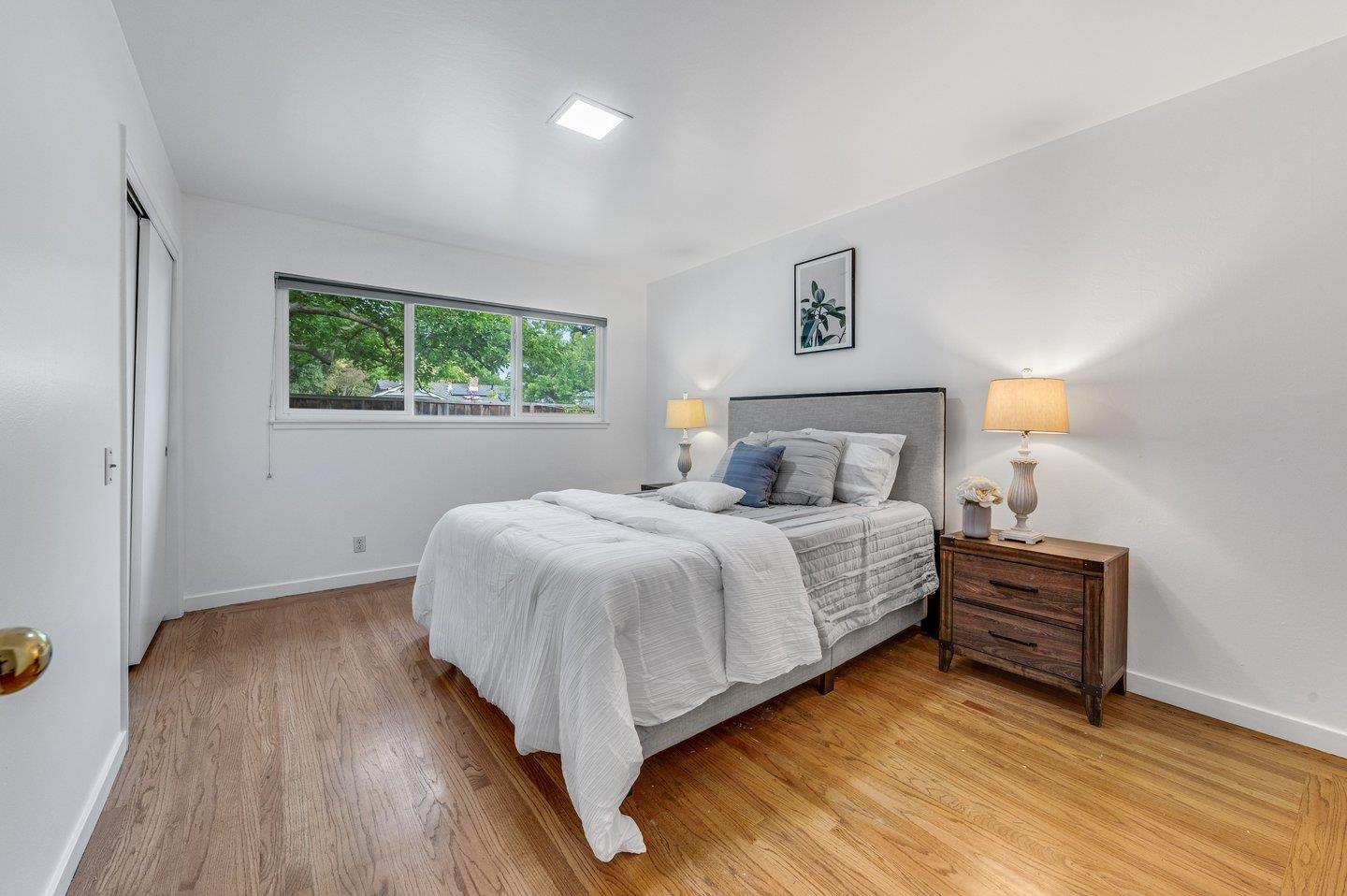 390 Cecelia Way Los Altos, CA 94022 - Photo 19 of 48 a bedroom with a bed and window