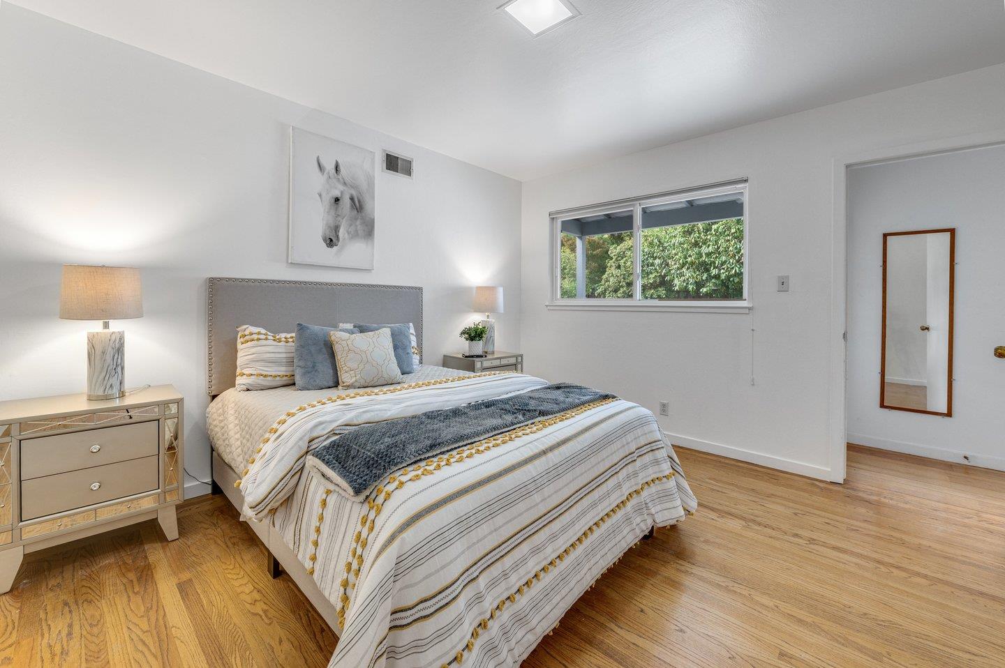 390 Cecelia Way Los Altos, CA 94022 - Photo 21 of 48 a bedroom with bed and a window