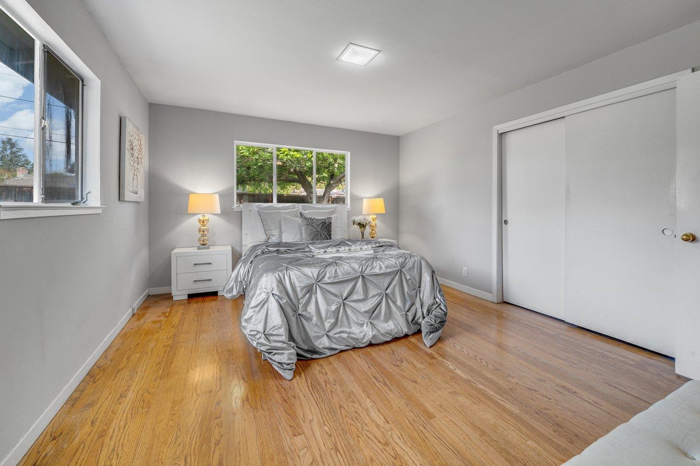390 Cecelia Way Los Altos, CA 94022 - Photo 24 of 48 a bedroom with a bed and a window
