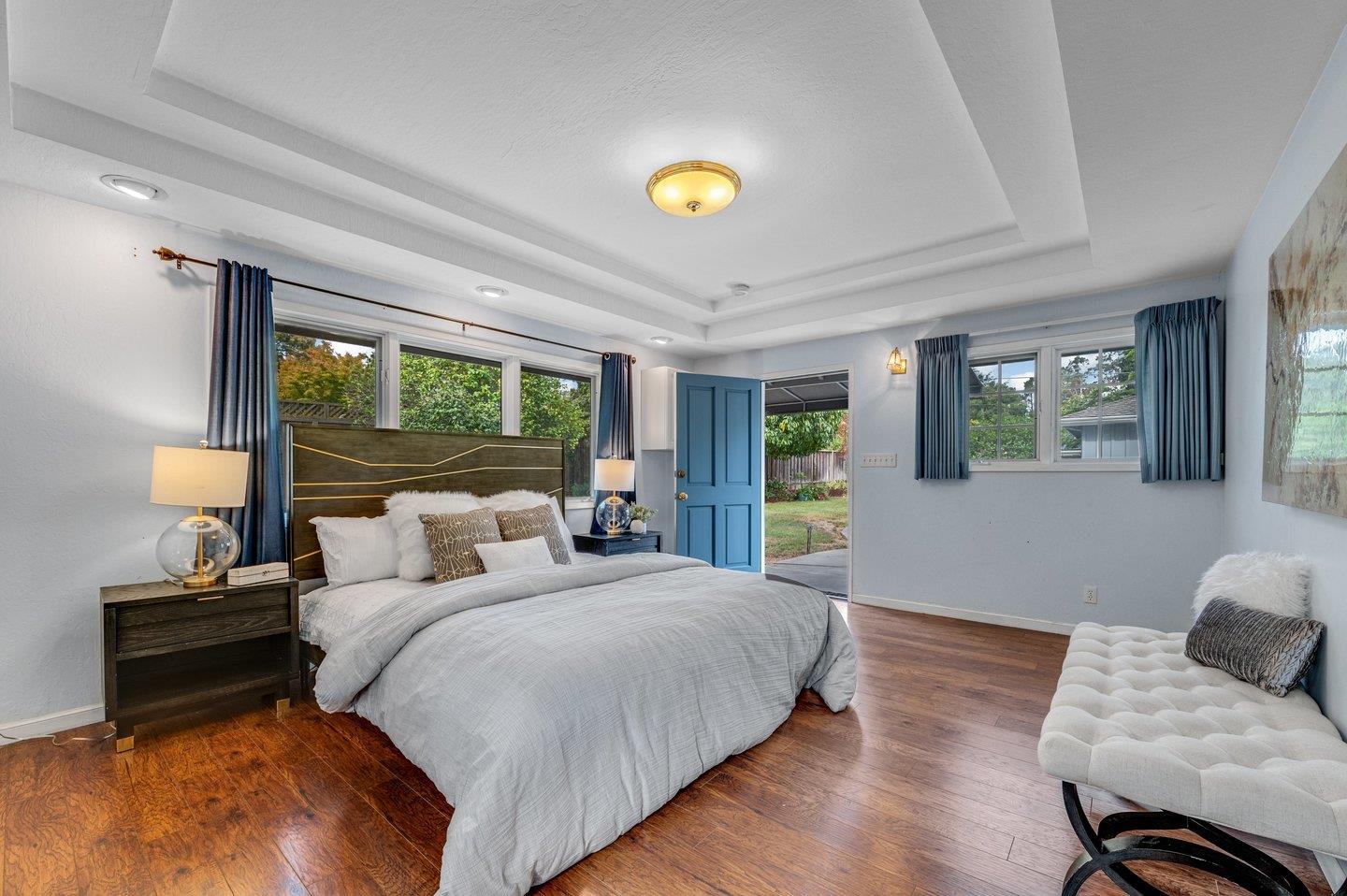 390 Cecelia Way Los Altos, CA 94022 - Photo 29 of 48 a bedroom with a bed and wooden floor