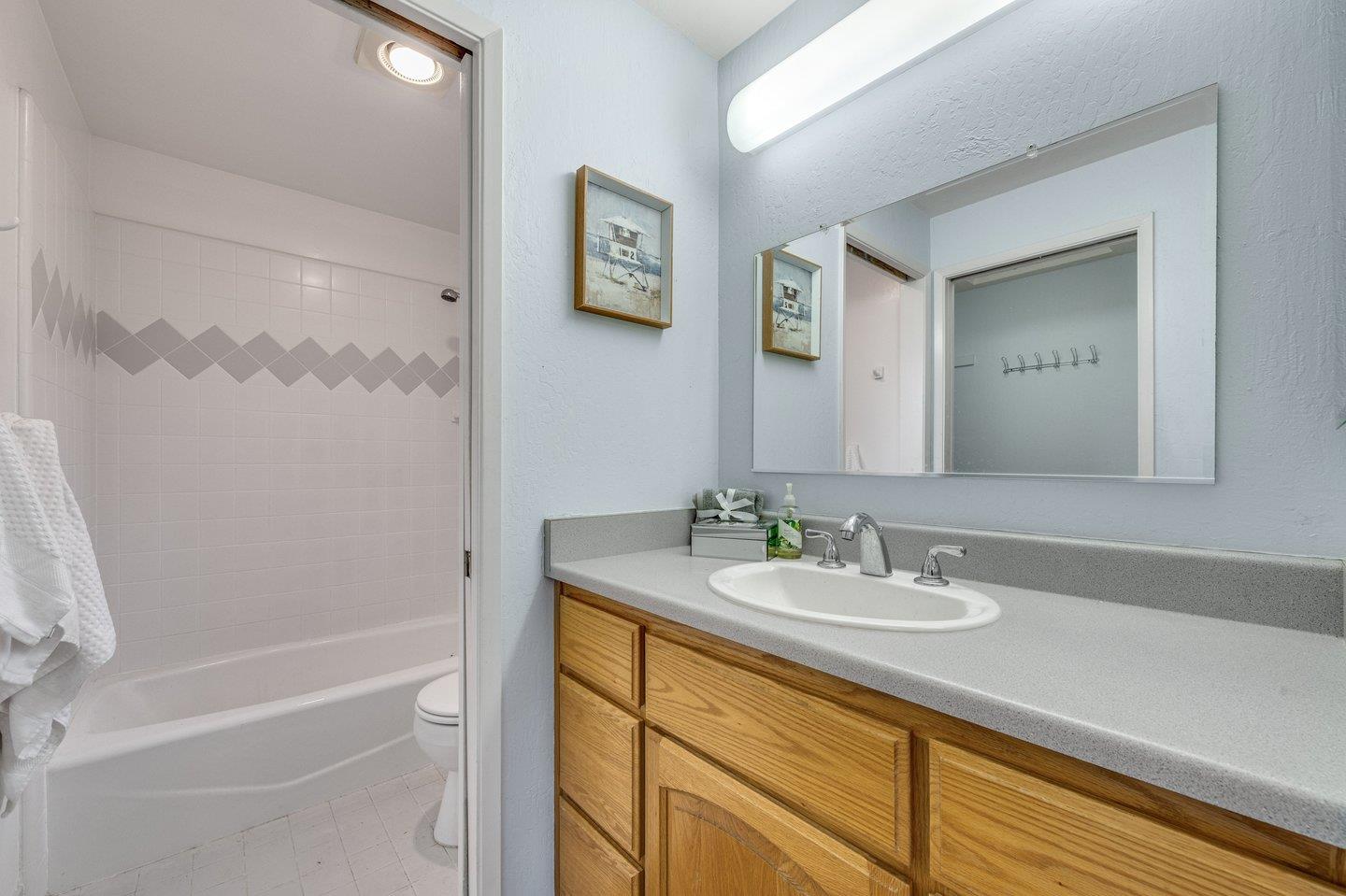 390 Cecelia Way Los Altos, CA 94022 - Photo 32 of 48 a bathroom with a sink and a mirror