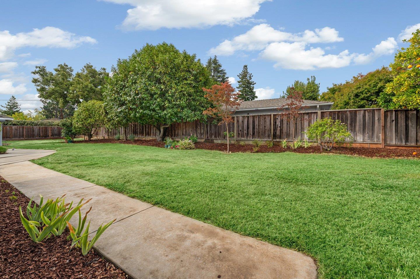 390 Cecelia Way Los Altos, CA 94022 - Photo 43 of 48 a view of a backyard with a garden