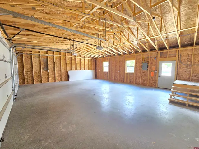 a view of a room with windows