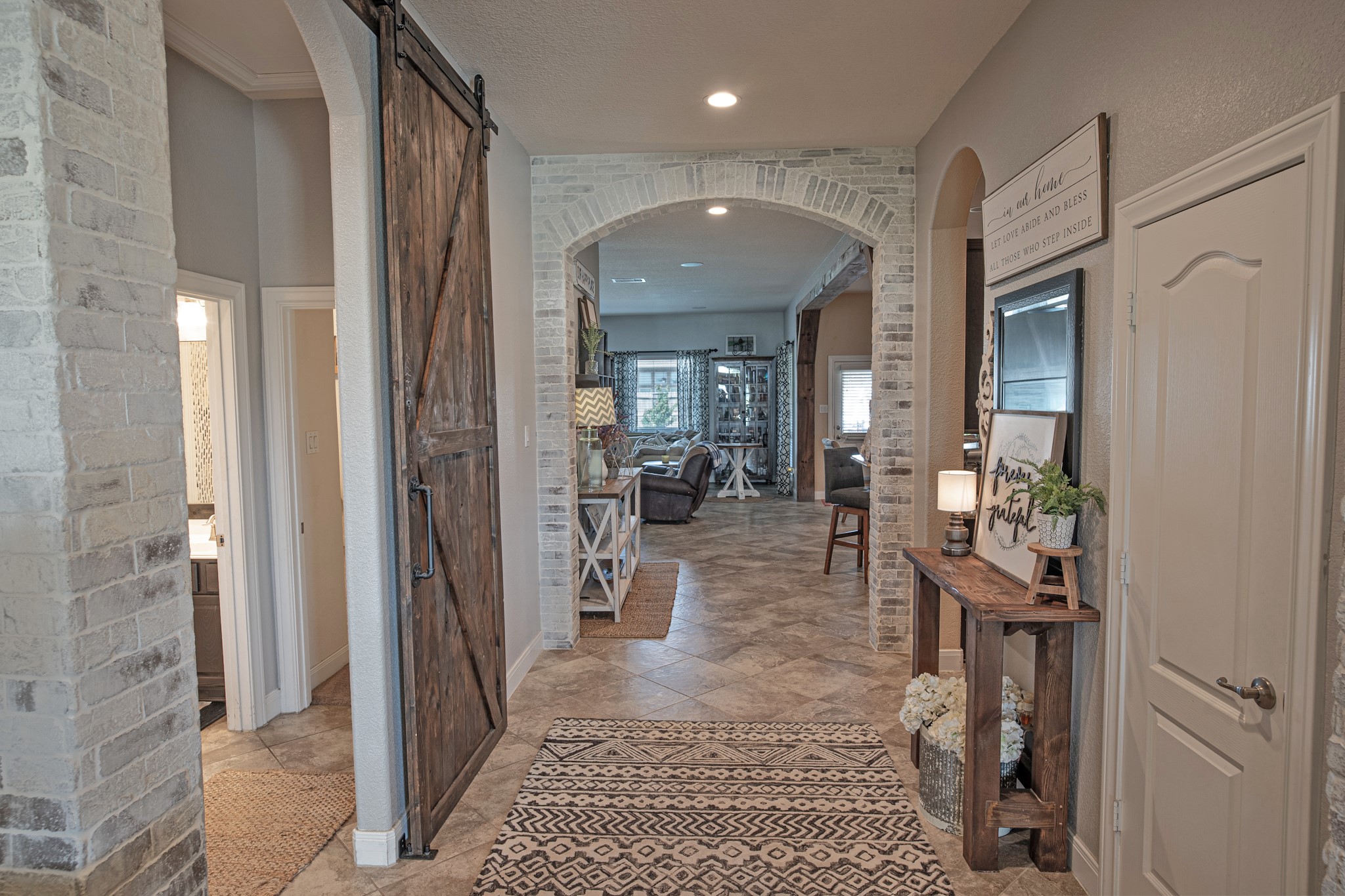 1283 Laurel Lane Angleton, TX 77515 - Photo 8 of 40 Wooden Barn door allows privacy for the 3 BR & bath