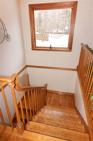 41 Frye Road Bolton, MA 01740 - Photo 12 of 24 a view of wooden floor with a window