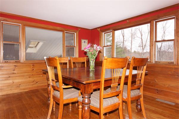41 Frye Road Bolton, MA 01740 - Photo 5 of 24 a dining room with furniture and wooden floor