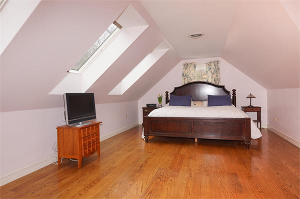 41 Frye Road Bolton, MA 01740 - Photo 6 of 24 a bedroom with a bed and wooden floor