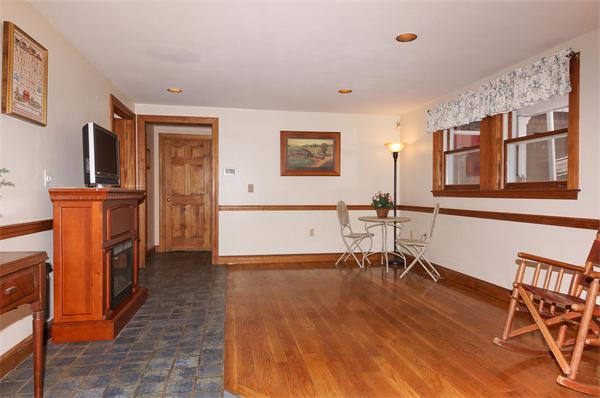41 Frye Road Bolton, MA 01740 - Photo 9 of 24 a view of a livingroom with furniture and an empty room