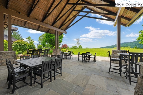 Lot 99 Nightshade Road Boone, NC 28607 - Photo 12 of 24 a view of a patio with a table chairs and a table