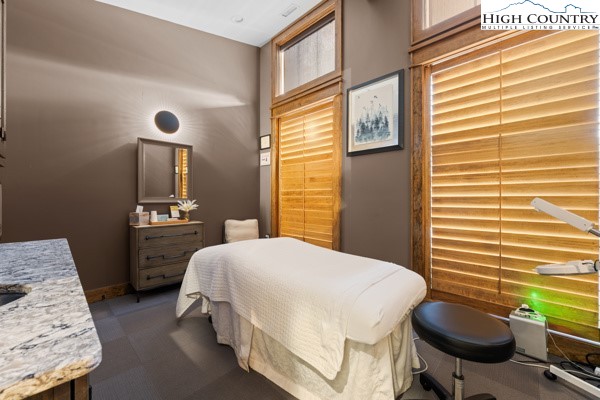 Lot 99 Nightshade Road Boone, NC 28607 - Photo 14 of 24 a bedroom with a bed and a table