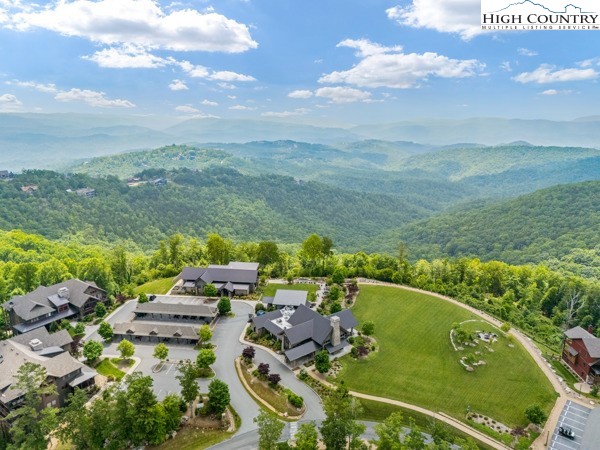 Lot 99 Nightshade Road Boone, NC 28607 - Photo 16 of 24 a view of a lake with a yard