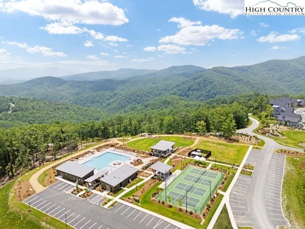 a view of an outdoor space and tennis court