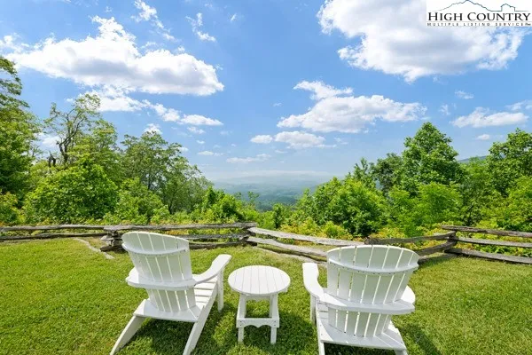 a view of a patio with a table chairs and a table