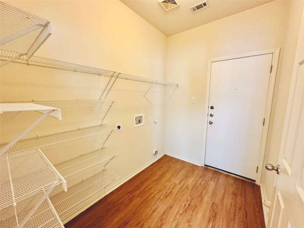 2205 Boyds Way Austin, TX 78748 - Photo 13 of 40 a view of a room with wooden floor