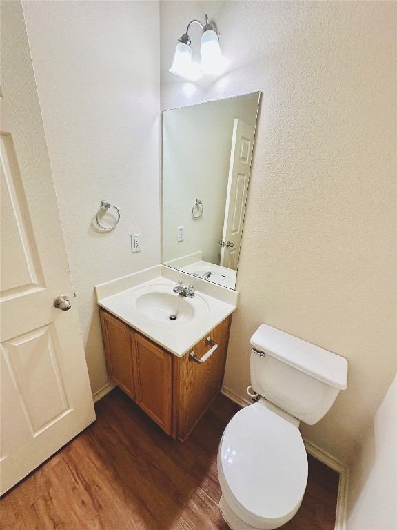 2205 Boyds Way Austin, TX 78748 - Photo 14 of 40 a bathroom with a toilet sink and mirror