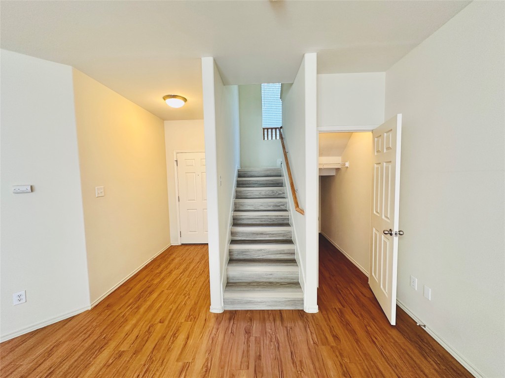 2205 Boyds Way Austin, TX 78748 - Photo 15 of 40 a view of a hallway with wooden floor and entryway