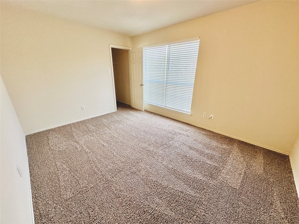 2205 Boyds Way Austin, TX 78748 - Photo 19 of 40 an empty room with windows