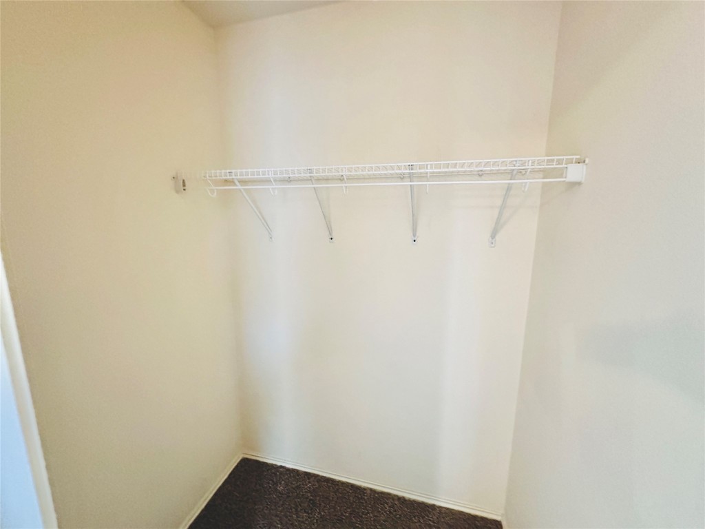 2205 Boyds Way Austin, TX 78748 - Photo 22 of 40 a view of small space with racks on the wall