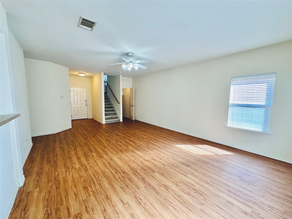 2205 Boyds Way Austin, TX 78748 - Photo 5 of 40 wooden floor in an empty room with a window