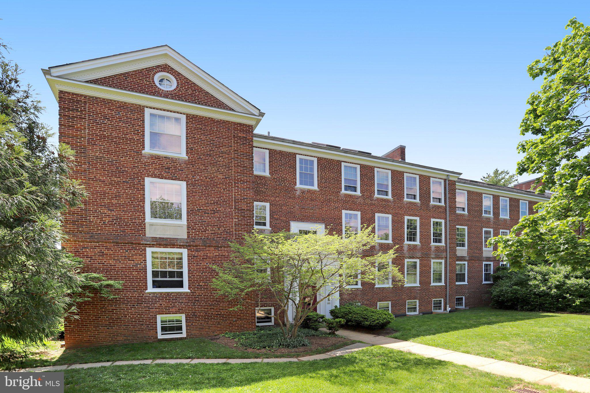 3856 Porter Street Northwest, Unit B368 Washington, DC 20016 - Photo 3 of 41 Large corner unit with wall of windows