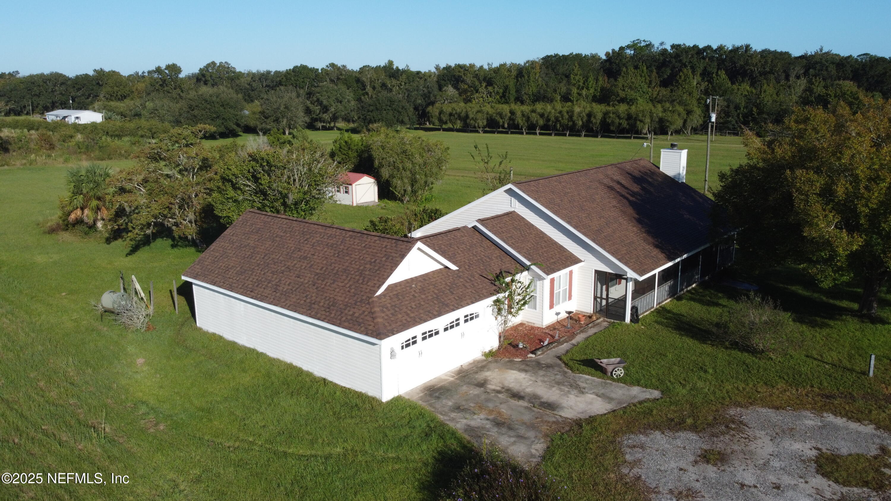 8905 Reid Packing House Road Hastings, FL 32145 - Photo 32 of 40 an aerial view of a house