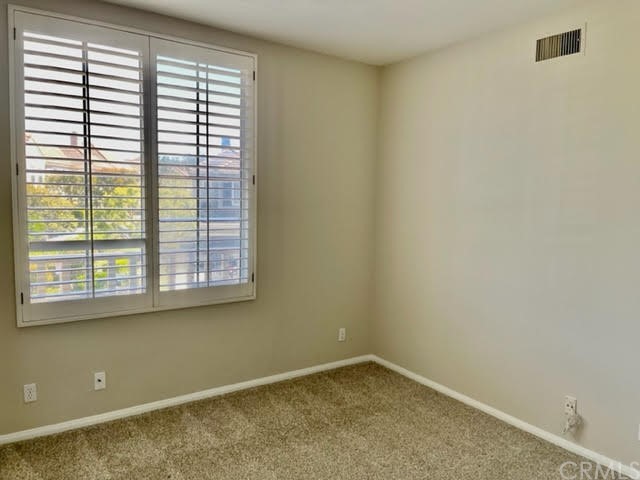 19 Avignon Newport Coast, CA 92657 - Photo 13 of 14 an empty room with a window
