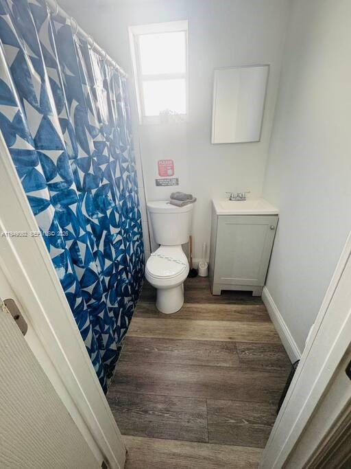 7638 North Miami Avenue, Unit 4 Miami, FL 33150 - Photo 2 of 11 a bathroom with a sink and a toilet