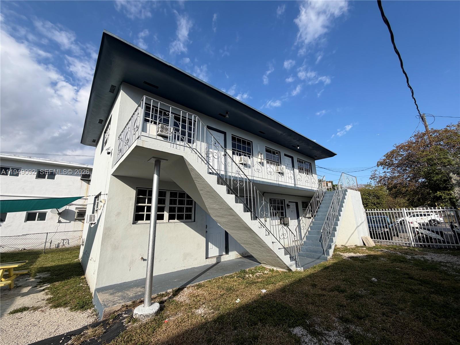 7638 North Miami Avenue, Unit 4 Miami, FL 33150 - Photo 7 of 11 a view of a house with large windows