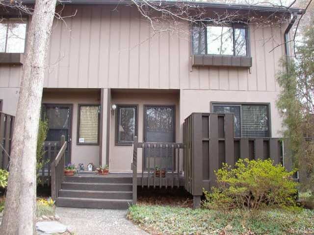Tucked away in the woods, yet convenient to everything! Exterior Front